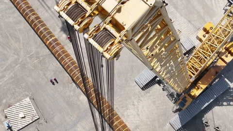 Operating large cranes and pipes on a deepwater rig Stock Footage 280361245