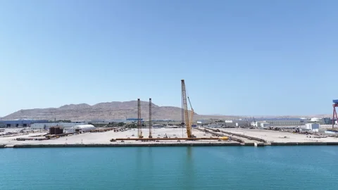 Operating large cranes and pipes on a deepwater rig Stock Footage 280362209