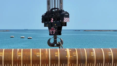 Operating large cranes and pipes on a deepwater rig Stock Footage 280362508