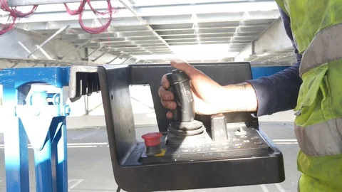 Operating A Lift II Stock Footage 123947745