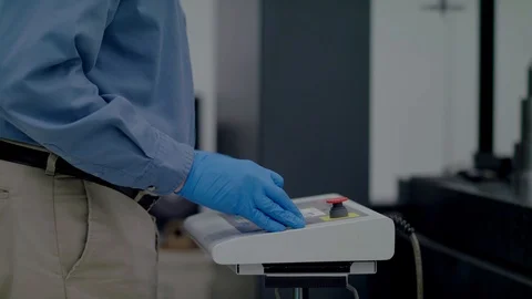 OPERATING MACHINERY IN TECH ROOM 스톡 동영상 108046529