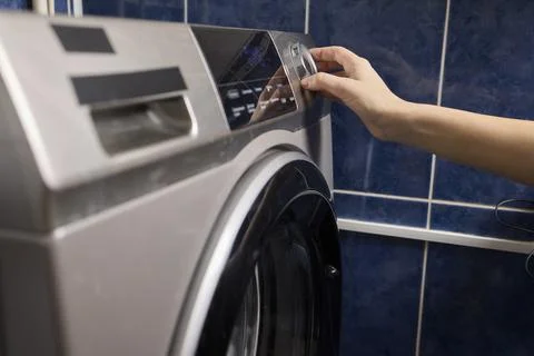 Operating a Modern Washing Machine A Comprehensive Guide to Efficient, User Stock Photos
