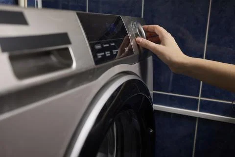 Operating a Modern Washing Machine A Comprehensive Guide to Efficient, User Stock Photos