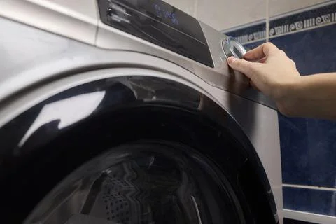 Operating a Modern Washing Machine A Comprehensive Guide to Efficient, User Stock Photos