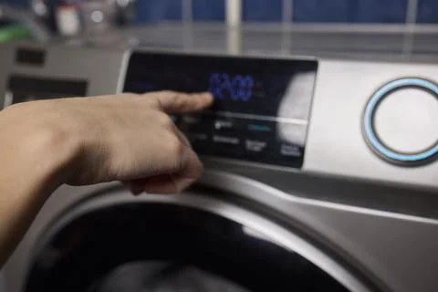 Operating a Modern Washing Machine A Comprehensive Guide to Efficient, User Stock Photos