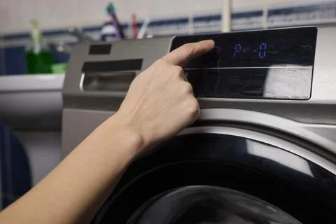 Operating a Modern Washing Machine A Comprehensive Guide to Efficient, User Stock Photos
