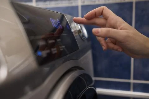 Operating a Modern Washing Machine A Comprehensive Guide to Efficient, User Stock Photos
