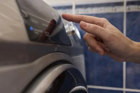 Operating a Modern Washing Machine A Comprehensive Guide to Efficient, User Stock Photos