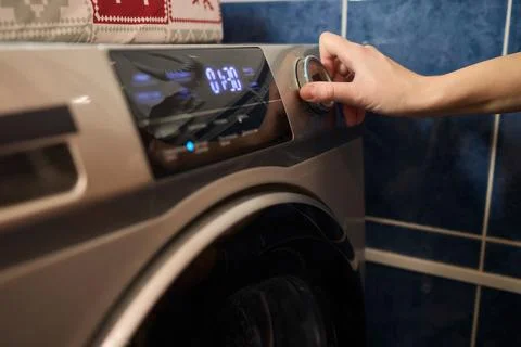 Operating a Modern Washing Machine A Comprehensive Guide to Efficient, User Stock Photos