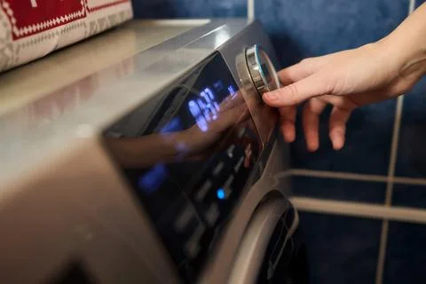 Operating a Modern Washing Machine A Comprehensive Guide to Efficient, User Stock Photos