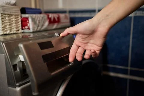 Operating a Modern Washing Machine A Comprehensive Guide to Efficient, User Stock Photos