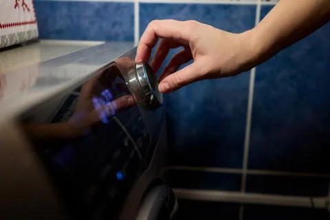 Operating a Modern Washing Machine A Comprehensive Guide to Efficient, User Stock Photos