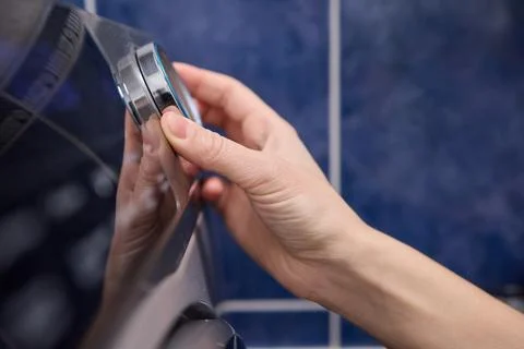Operating a Modern Washing Machine A Comprehensive Guide to Efficient, User Stock Photos