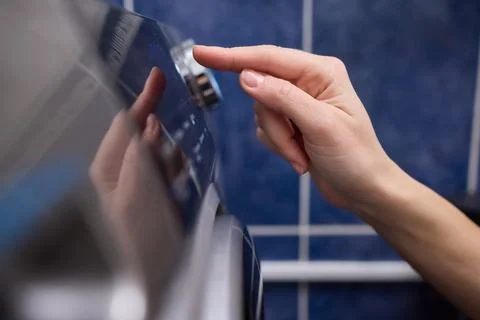 Operating a Modern Washing Machine A Comprehensive Guide to Efficient, User Stock Photos