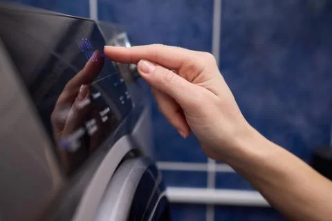 Operating a Modern Washing Machine A Comprehensive Guide to Efficient, User Stock Photos