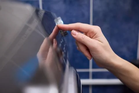 Operating a Modern Washing Machine A Comprehensive Guide to Efficient, User Stock Photos