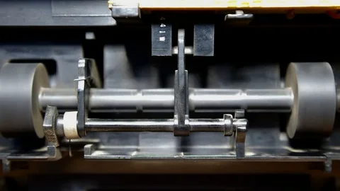Operating the printer the paper feed roller Stock Footage 73710916
