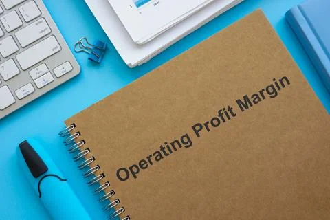 Operating profit margin documents, papers and marker. Stock-Fotos