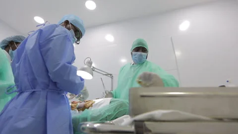 Operating room and team of surgeons, AFRICA Stock Footage 322020218
