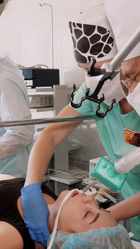 Operating room, patient is prepared for surgery, anesthesia is administered. Stock Footage 318725297