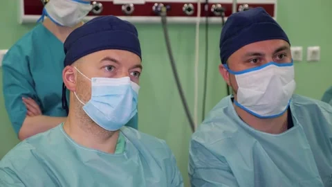 In the operating room two surgeons during the surgery procedure. Stock Footage 131869608
