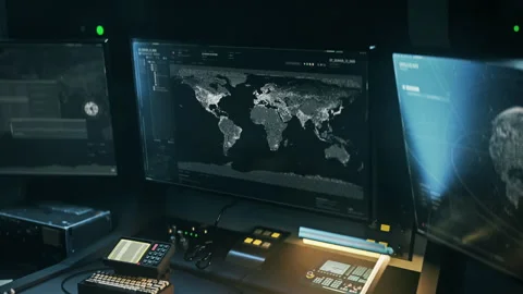 Operating the satellite network system from a futuristic military control room Stock Footage 243497571