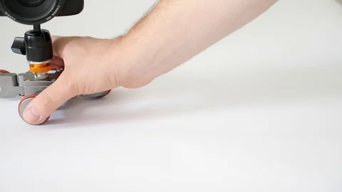 Operating small motorized dolly Stock Footage 77236558