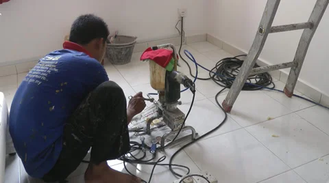 Operating small power tool Stock Footage 39847429