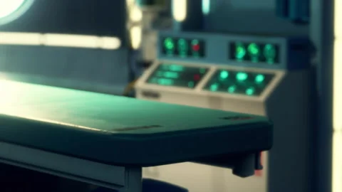 Operating table and medical equipment in a surgical room at a hospital Stock Footage 344966717