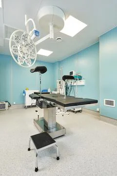 Operating table in a specially equipped operating room Stock Photos