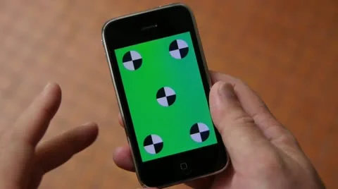 Operating a touch screeen smartphone. Green Screen. Stock Footage 20506338