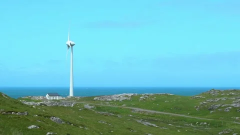 Operating Wind Mill Next to the Ocean Stock Footage 156326150