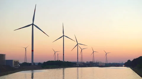 Operating wind turbines along the river. Stock Footage 65517795