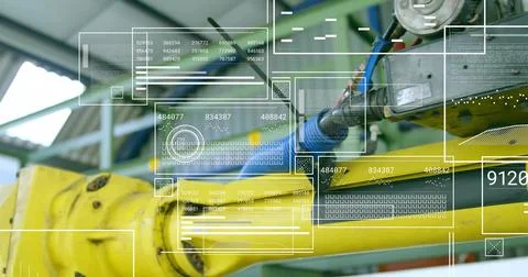 Operating yellow robotic arm assembly in factory cell, showing braided blue Stock Photos