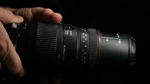 Operating Zoom Ring on 70-300mm Lens Close Up Stock Footage 329966789