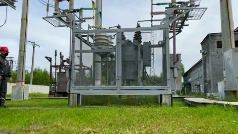 Operation and maintenance of equipment at a distribution substation Stock Footage 136810618