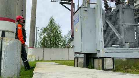 Operation and maintenance of equipment at a distribution substation Video stock 136810668