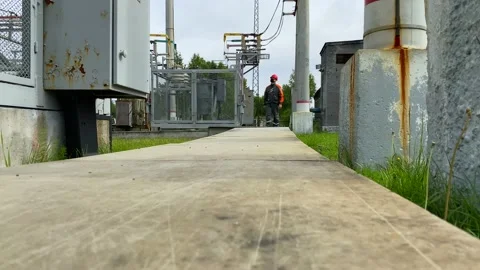 Operation and maintenance of equipment at a distribution substation Stock Footage 136810759