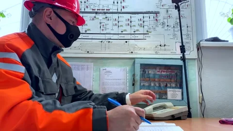Operation and maintenance of equipment at a distribution substation Stock Footage 136810921