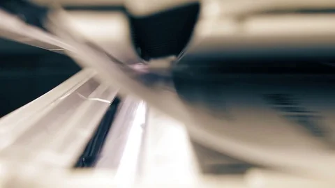 Operation of the automatic feeder of paper (macro) Stock Footage 81402606