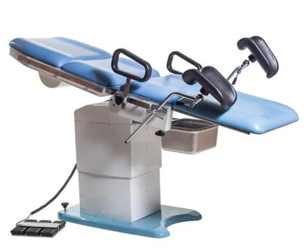 Operation bed and diagnostic genicologic chair, women's consultation Stock Photos