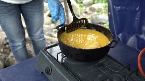 Operation Blessing volunteer cooking eggs Stock Footage 108548405