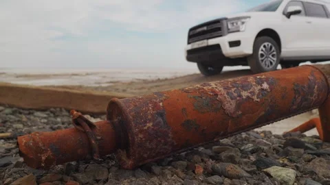 The operation of the car suspension in motion. Camera on the bottom of the car Stock Footage 292044735