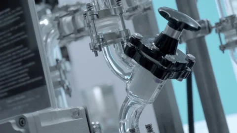 The operation of a complex and expensive chemical reactor in a laboratory Stock Footage 187455686