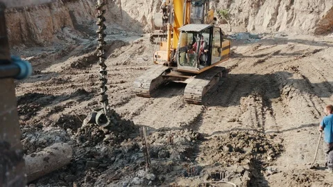 Operation of construction equipment with builders project factory industry Stock Footage 95919319