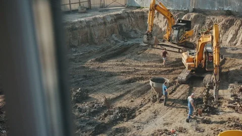 Operation of construction equipment with builders project factory industry Stock Footage 95927351