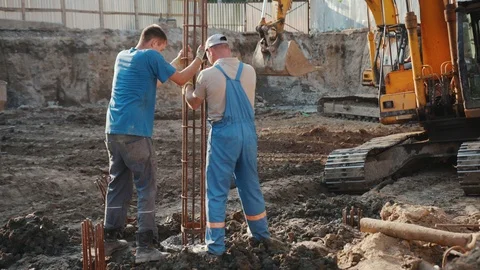 Operation of construction equipment with builders project factory industry Stock Footage 96037196