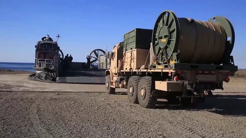 Operation Dawn Blitz: Truck approaching LCAC for loading Video stock 82064268