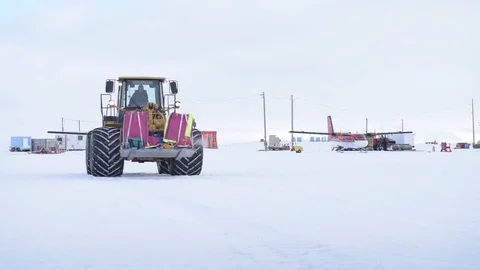 Operation Deep Freeze - Tractor being driven across snow in Antarctica Vídeos de archivo 82823581
