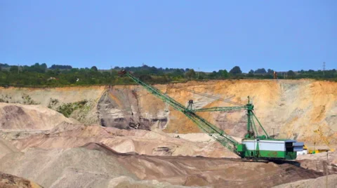 Operation of the excavator on career Stock Footage 66793933